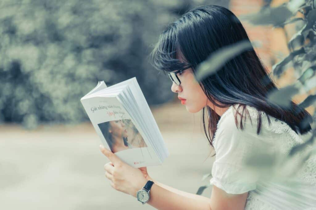 Girl Reading English Book